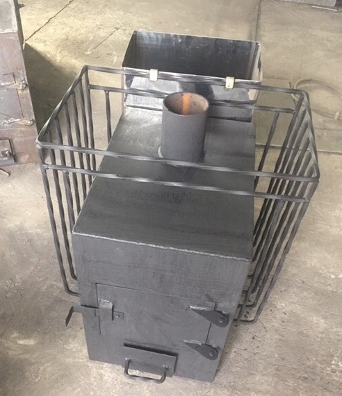 Печь малютка с двусторонней каменкой